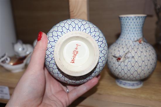 A pair of Japanese earthenware vases, impressed mark height 14.5cm
